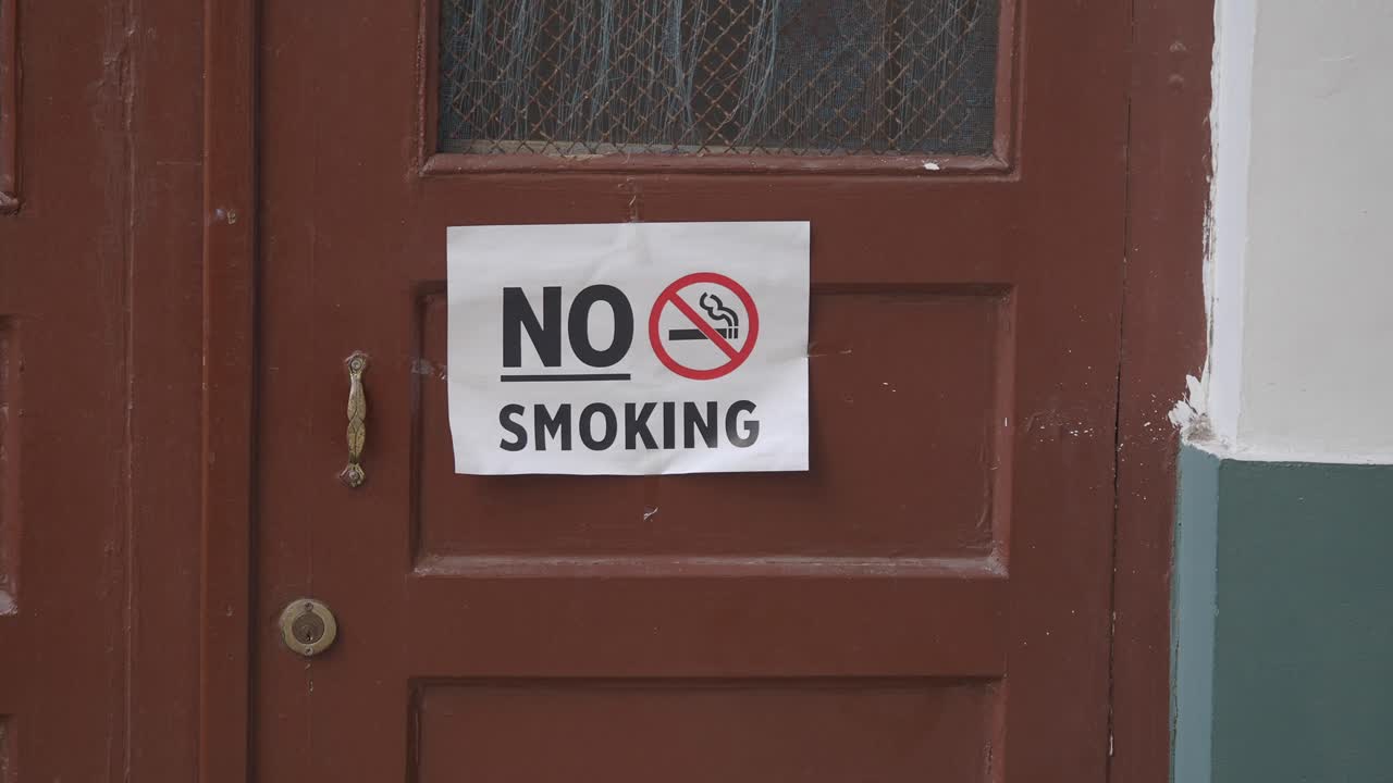 No Smoking Sign on a Door