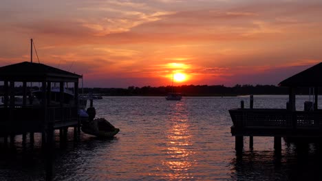 Sunset-view-from-a-dock-watching-boaters-go-by