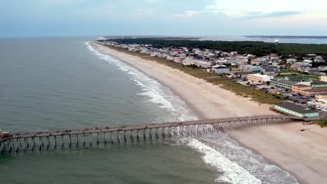 High-aerial-over-pier-at-kure-beach-nc,-north-carolina