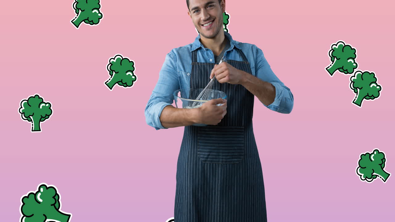 Animation of biracial man over broccoli icons on pink background