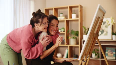 women painting together