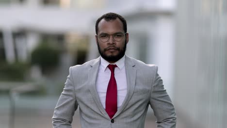 Front-view-of-confident-African-American-man-looking-at-camera