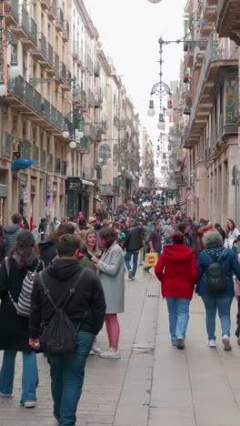 vertical video of a busy street with people in barcelona city