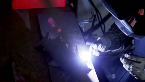 welder working in workshop 4k