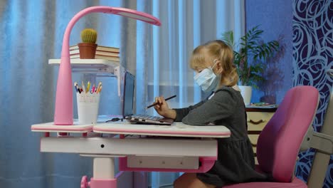 child girl pupil distance education homework with teacher on laptop webcam, online lesson at home