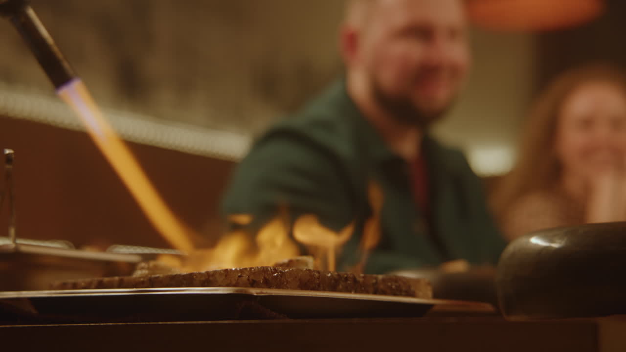 People enjoying dinner at a restaurant