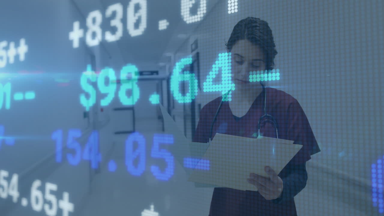 Reviewing documents over stock market data animation, medical professional in hospital corridor