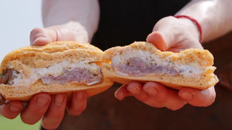 In-half-sliced-hamburger-being-presented