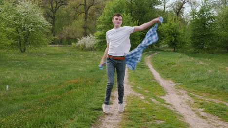 man walking in a spring park