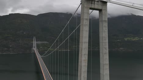 upgoing areal footage of one of the longest suspension bridges in the world