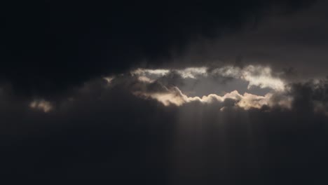 sun breaking through the rain clouds