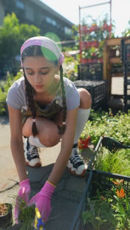 teenage girl gardening