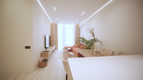 modern open-concept apartment living and dining area