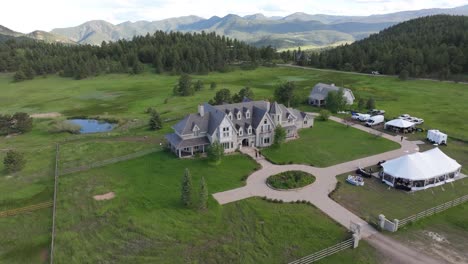 aerial view of wedding is happening at magical greystone castle, colorado