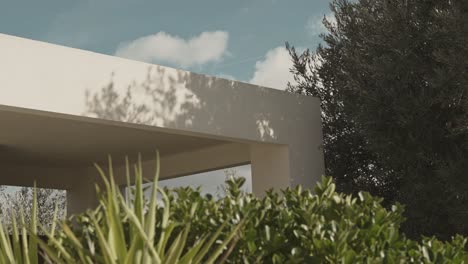 mediterranean architecture in resort arch in ibiza at sunset