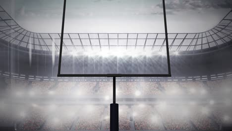 animation of american football goalposts and cloudy sky at floodlit stadium