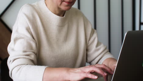 adult student using computer in classroom