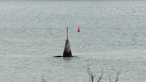 looking over carrick roads to black rock beacon, from pendennis head