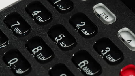 close-up of a point-of-sale (pos) terminal keypad