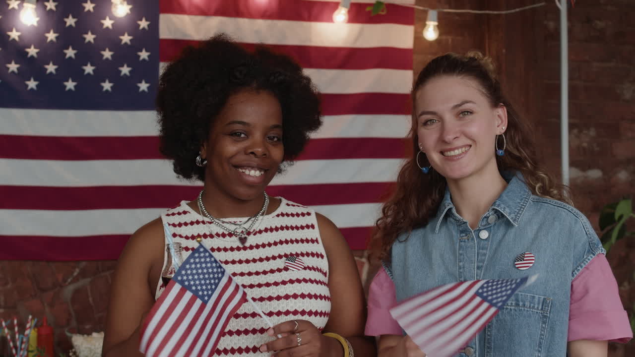 Two Friends Celebrating with American Flags
