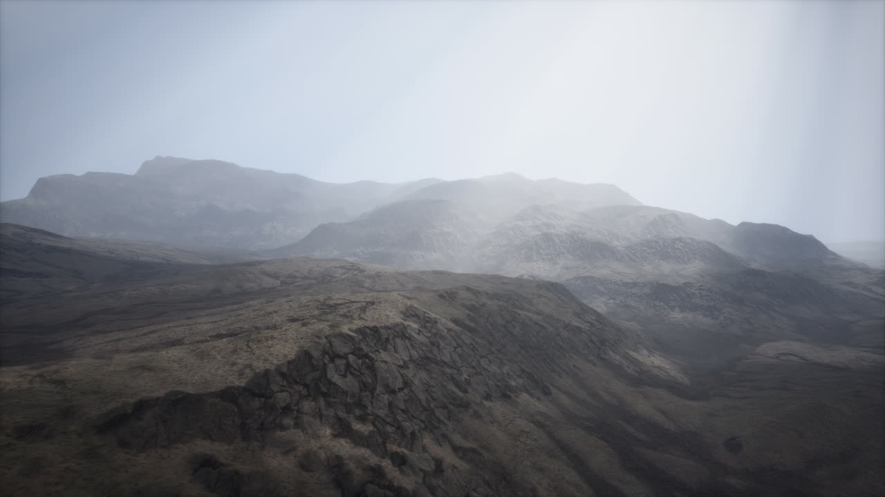 Sun Rays against the Backdrop of the Mountains