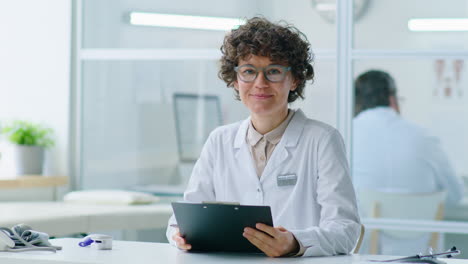 portrait of cheerful female doctor at work