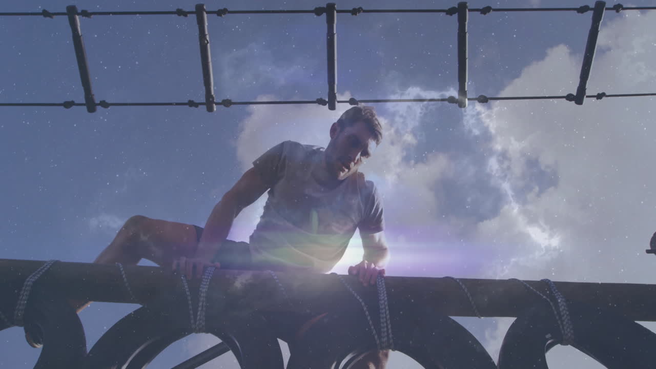 Climbing outdoor structure, man under cloudy sky with stars twinkling in background