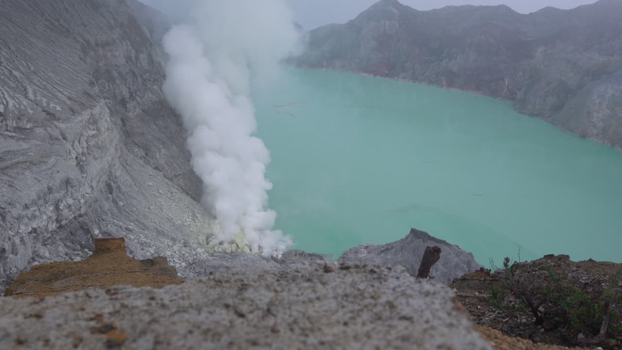 Sulfur toxic plume Ijen volcano lake Kawah Java island Indonesia nature crater