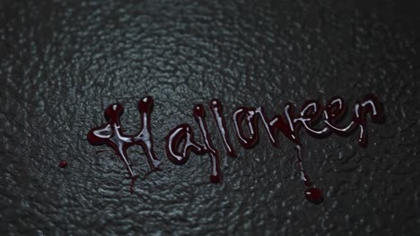 dripping blood letters spelling halloween against dark textured surface, conveying sinister mood for horror themed graphic design and seasonal marketing materials