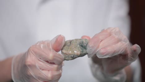 scientist examining a gemstone sample