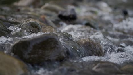 water flowing over rocks in stream