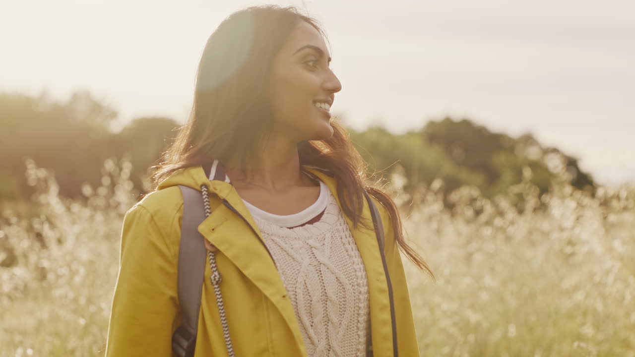 Relax, freedom and countryside with woman in field