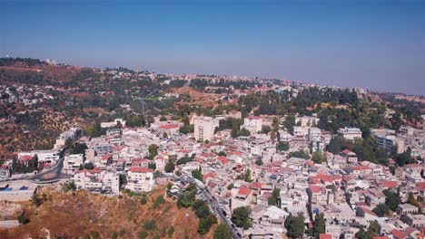 aerial view of a middle eastern town on hilly terrain