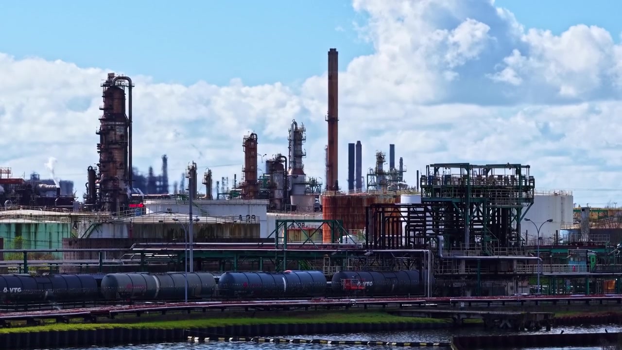 An Industrial Area With Storage Tanks and Factories in Le Havre, France - Aerial Drone Shot