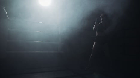 boxer training in a smoky ring