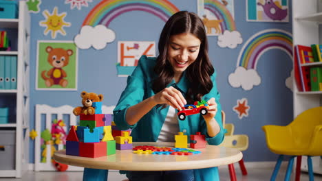 woman playing with children's toys in a playroom