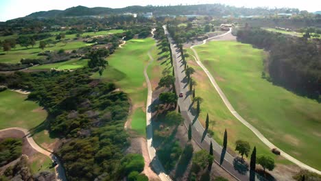 drone flies forward over road in vivid landscape, united states