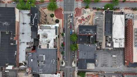 Street-and-junction-in-American-city-with-old-rooftops-of-buildings