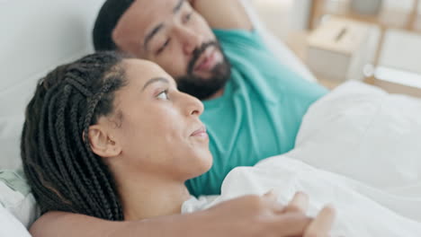 Bedroom,-holding-hands-and-relax-couple-talking