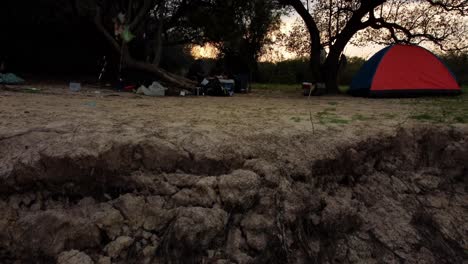 fishermen camp on a cold morning in the banks of the river