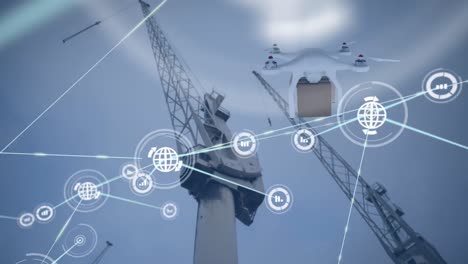 Animation-of-network-of-connections-with-icons-over-drone-with-box-and-cranes