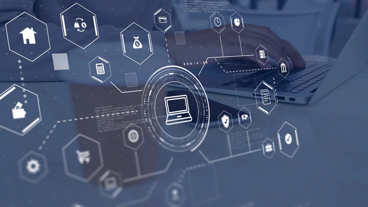 Worker typing at laptop, HUD appearing, forming hex business icons over phone and cup, showing data