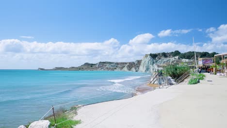 colorful cliffs and turquoise waters of a mediterranean beach