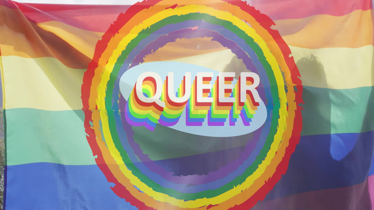 Animating rainbow-colored QUEER text over pride flag background