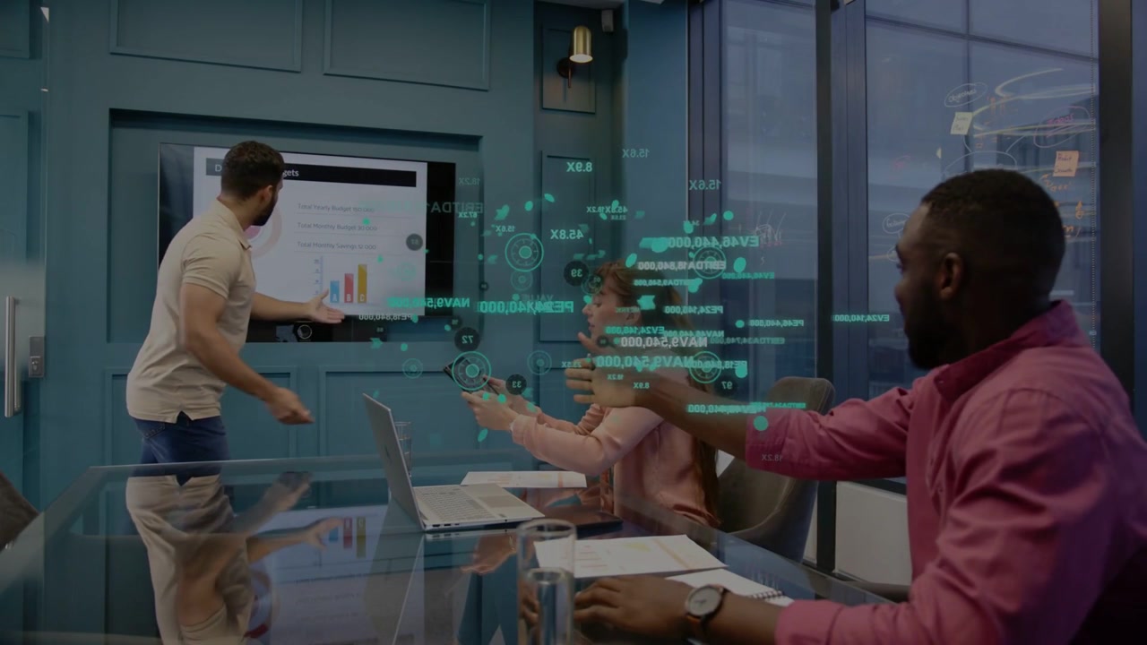 Vertical video: Handing remote man in tan polo explaining charts at glass table team using green AR