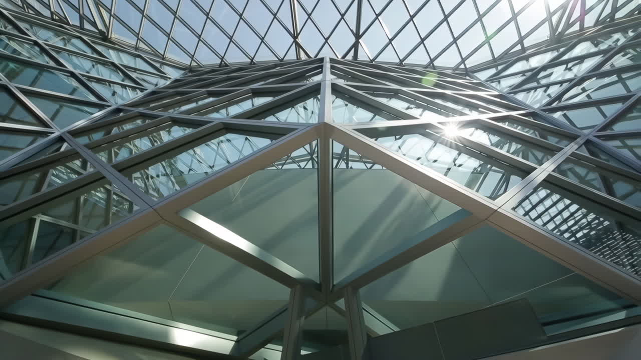 Geometric Glass and Metal Roof Structure of a Modern Building