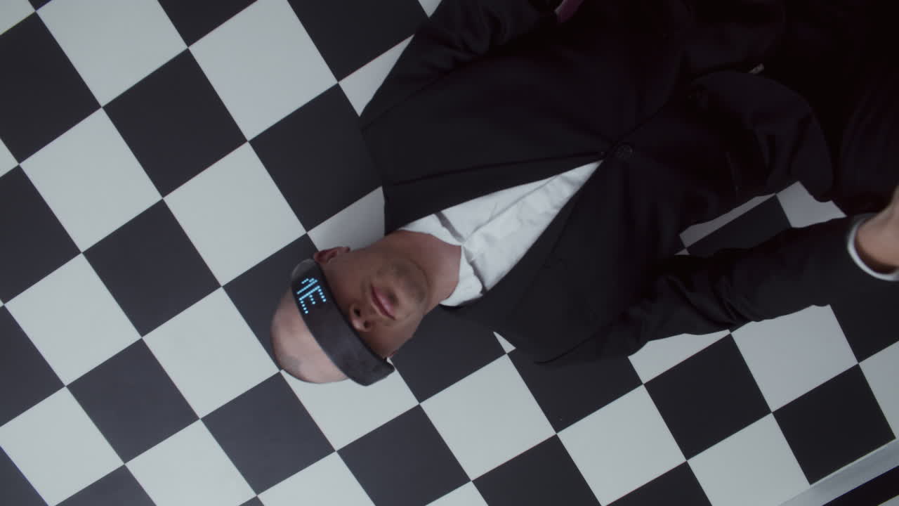 Man in VR Headset on Chessboard Floor