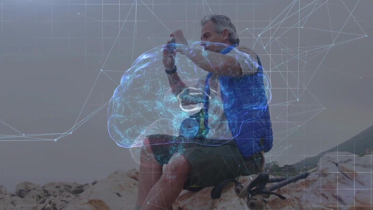 Cyclist sitting on shoreline tapping smartphone and initiating technology glowing brain overlay