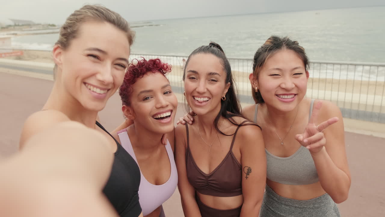 Friends Taking a Selfie After a Beach Workout