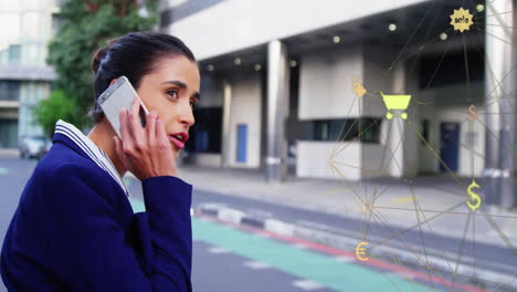 animación de conexiones con íconos de compras sobre mujer de negocios biracial usando teléfono inteligente